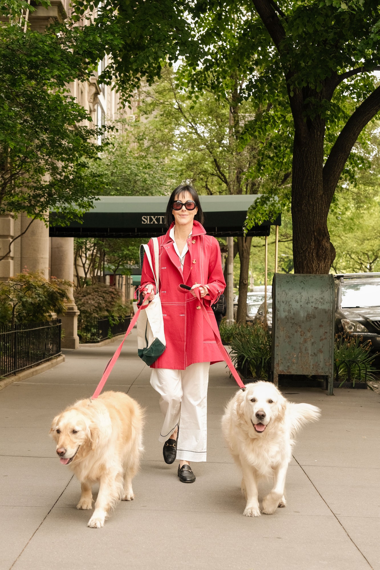 Hutton walks her dogs Henrietta and Salty back in New York City.