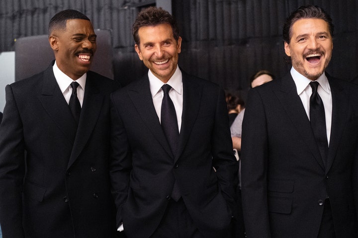 From left Colman Domingo in an Alexander McQueen suit Brioni shirt and Ralph Lauren Purple Label tie Bradley Cooper in a...